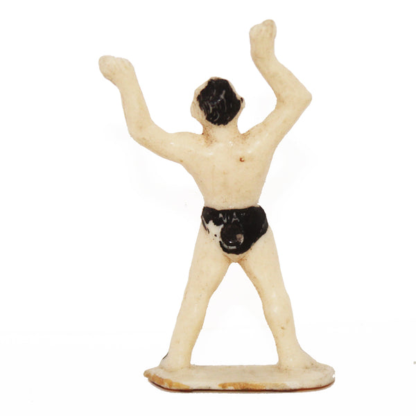 Figurine publicitaire plastique Café Nadi Le Cirque : équilibriste aux bras levés