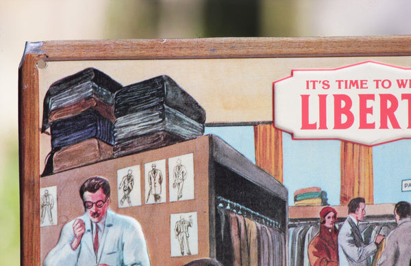 Plaque publicitaire vintage en tôle emboutie pour la marque de denim Liberto
